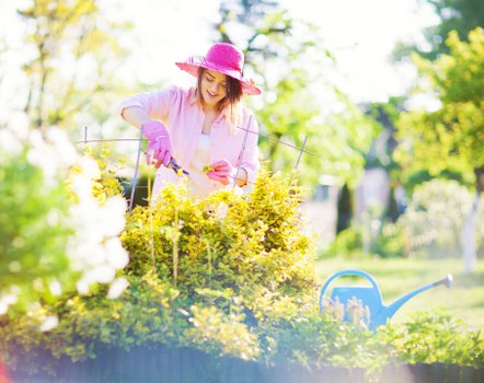 Tree care professional using notes to improve service procedures